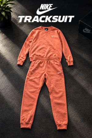 Ensemble jogging Nike orange haut M et bas S occasion
