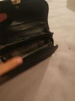 Portefeuille Volcom noir stylé, parfait pour l'été!
