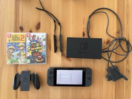 Nintendo Switch Konsole mit Zubehör und zwei Spielen