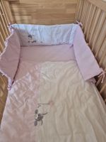 Baby Bettwaesche Bettumrandung mit Waschbaer Motiv rosa 