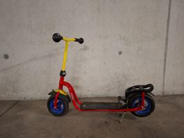 Kinderroller Puky rot gelb blau mit Ständer gebraucht