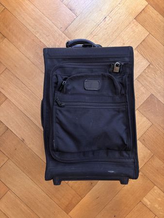 Tumi Reisekoffer schwarz mit Rollen gebrauchter Zustand