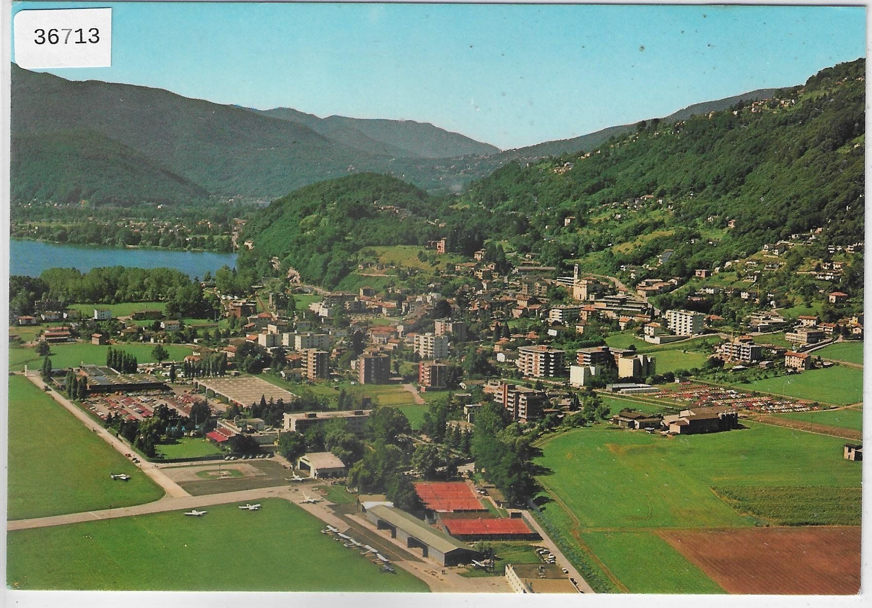 Cartoline postali: Flugaufnahme Agno TI – Usato da Ettingen venduto da Kartenplanet