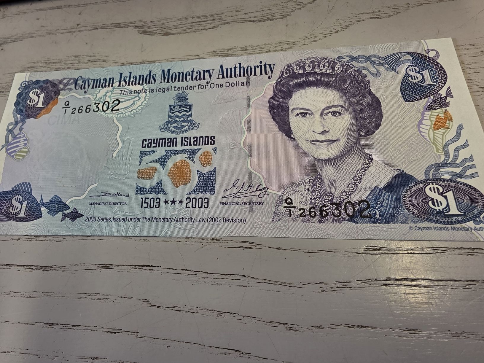 Banknoten: Cayman Islands 1 Dollar Banknote 2003  – Neu und originalverpackt aus Herisau von Antiques.AR