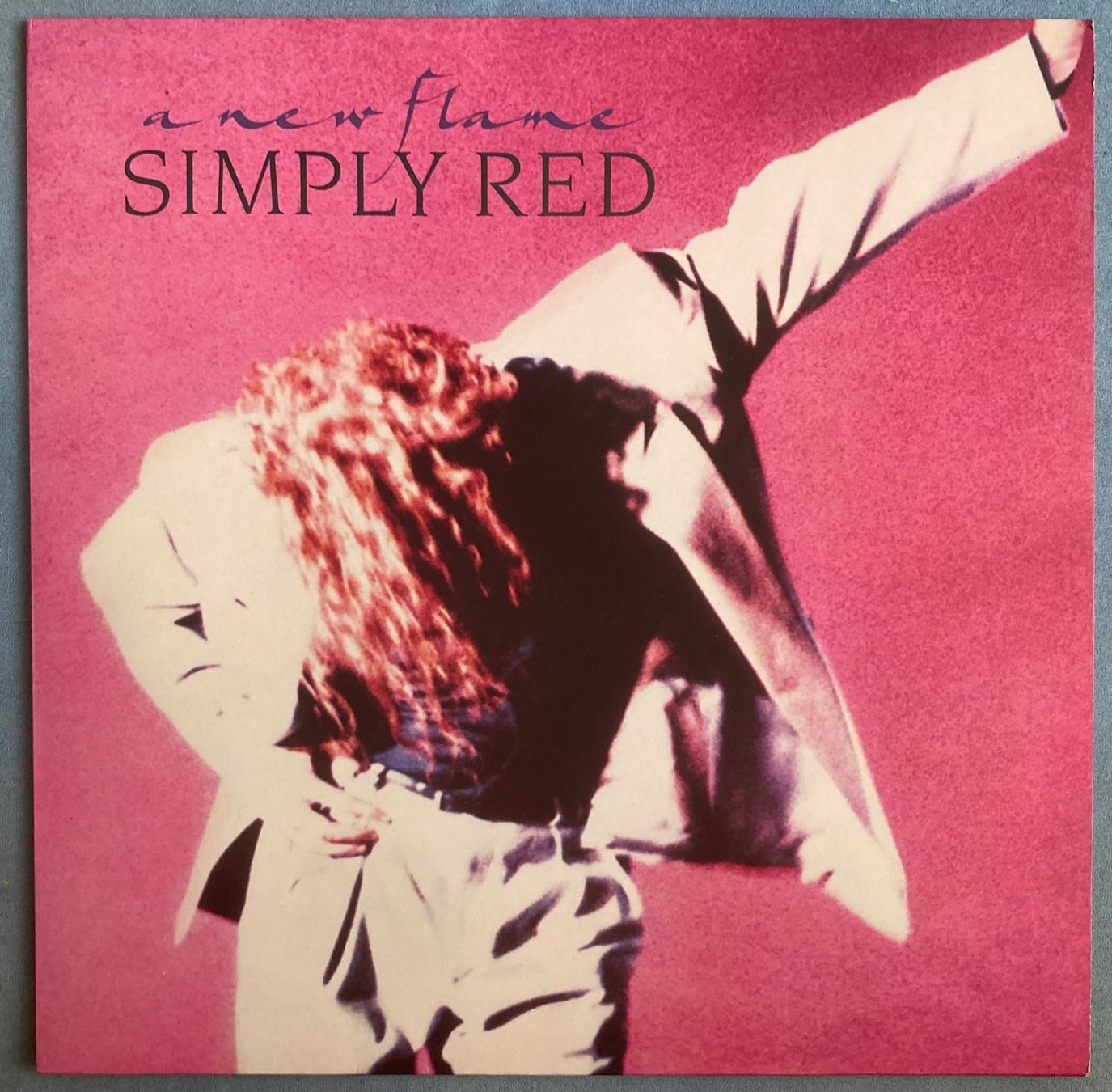 Vinyles: SIMPLY RED - A NEW FLAME – D'occasion à Poliez-Pittet par Newtown-Records