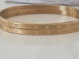 2 Edelstahl-Armbänder / Armreifen, goldfarben