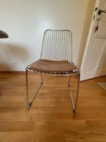 Chaises design en métal chromé avec assise en cuir