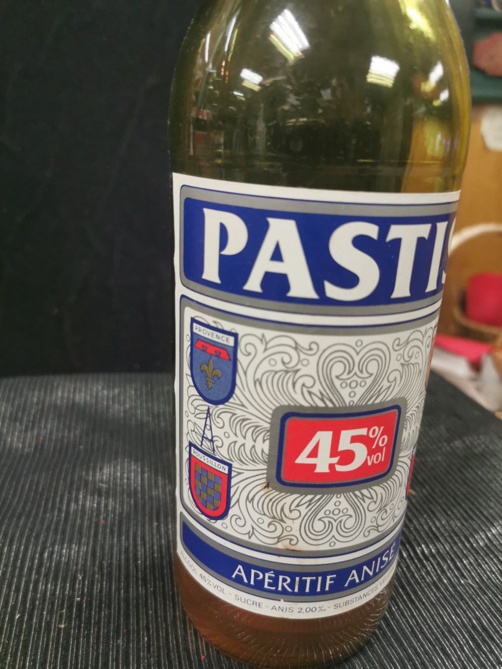 Bevande alcoliche: TRÈS ANCIENNE BOUTEILLE DE PASTIS ENTAMÉE – Usato da Genève venduto da Leboucheoreilles 1
