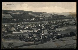 AK Oberburg, Ortsansicht mit Kirche und umliegender Hügellan