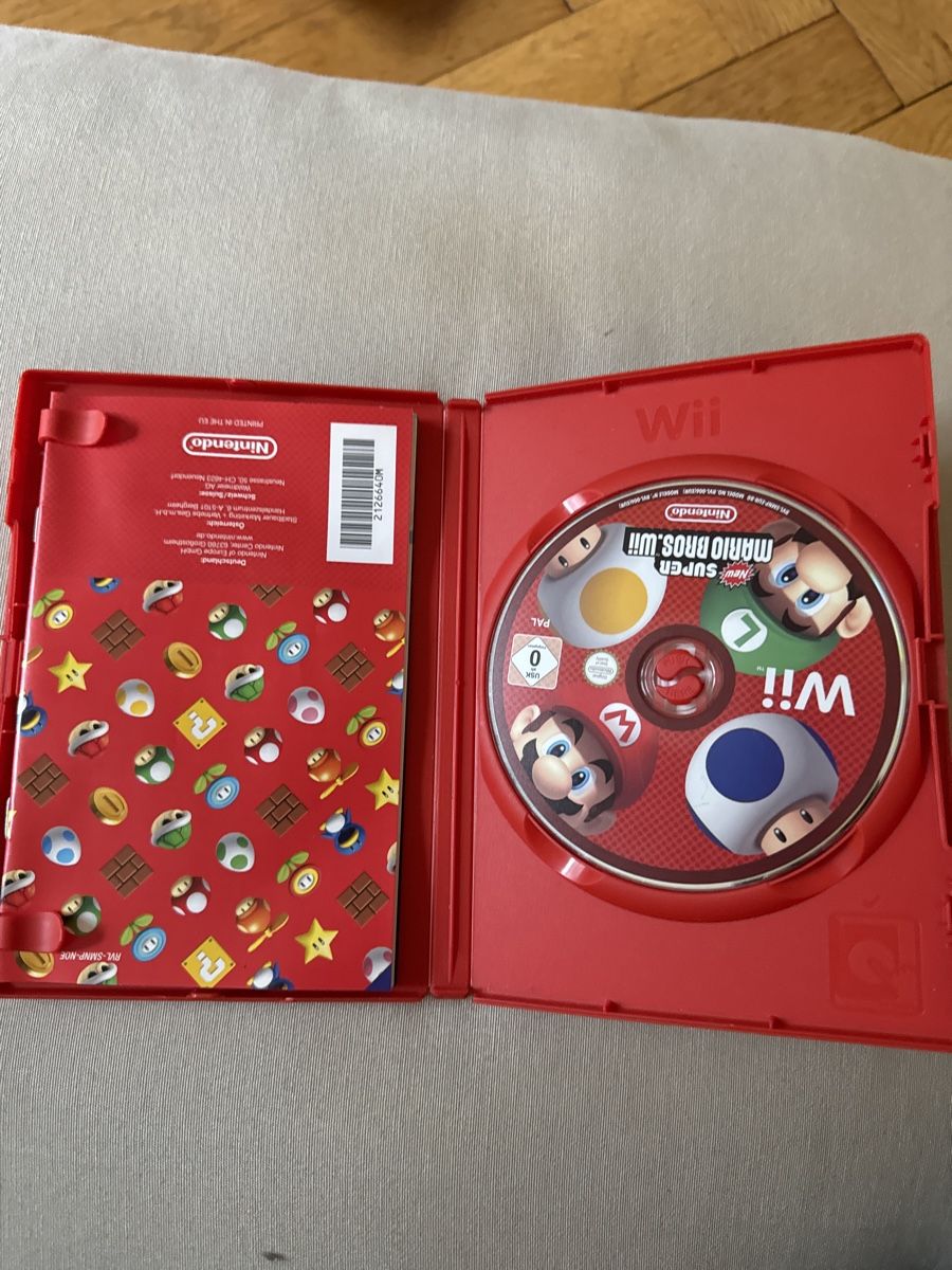 Spiele: New Super Mario Bros Wii – Gebraucht aus Zürich von  2