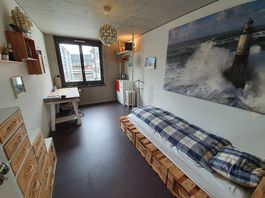 Bett aus Paletten mit Rost