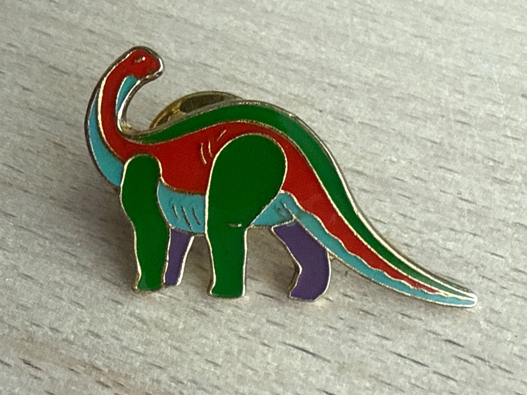 Plaketten & Abzeichen: Pin Dinosaurier – Gebraucht aus Glattbrugg von Schweigmatt