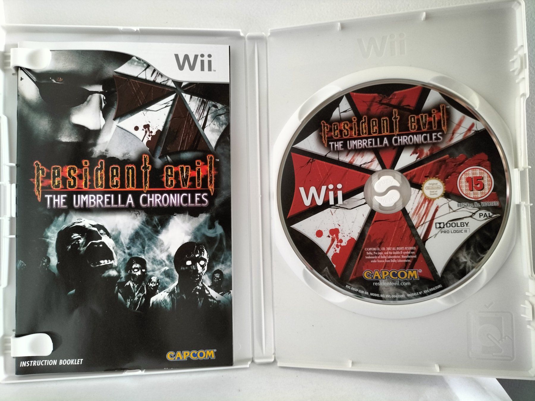 Spiele: Resident Evil Umbrella Chronicles  (Wii) – Gebraucht aus Nürensdorf von  2