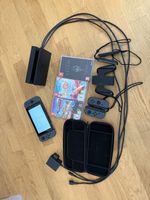 Nintendo Switch Konsole mit Spielen und Zubehör
