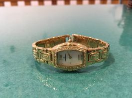 Vends trés belle montre femme en or plaqué