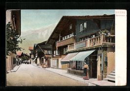 AK Brienz, Dorfstrasse mit Geschäften