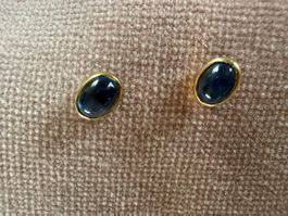 Ohrstecker mit blauem Sternsaphir in Gelbgold