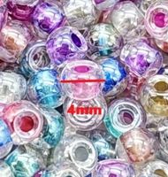 10g Glas-Rocailles 4mm transparent mit farbigem Kern