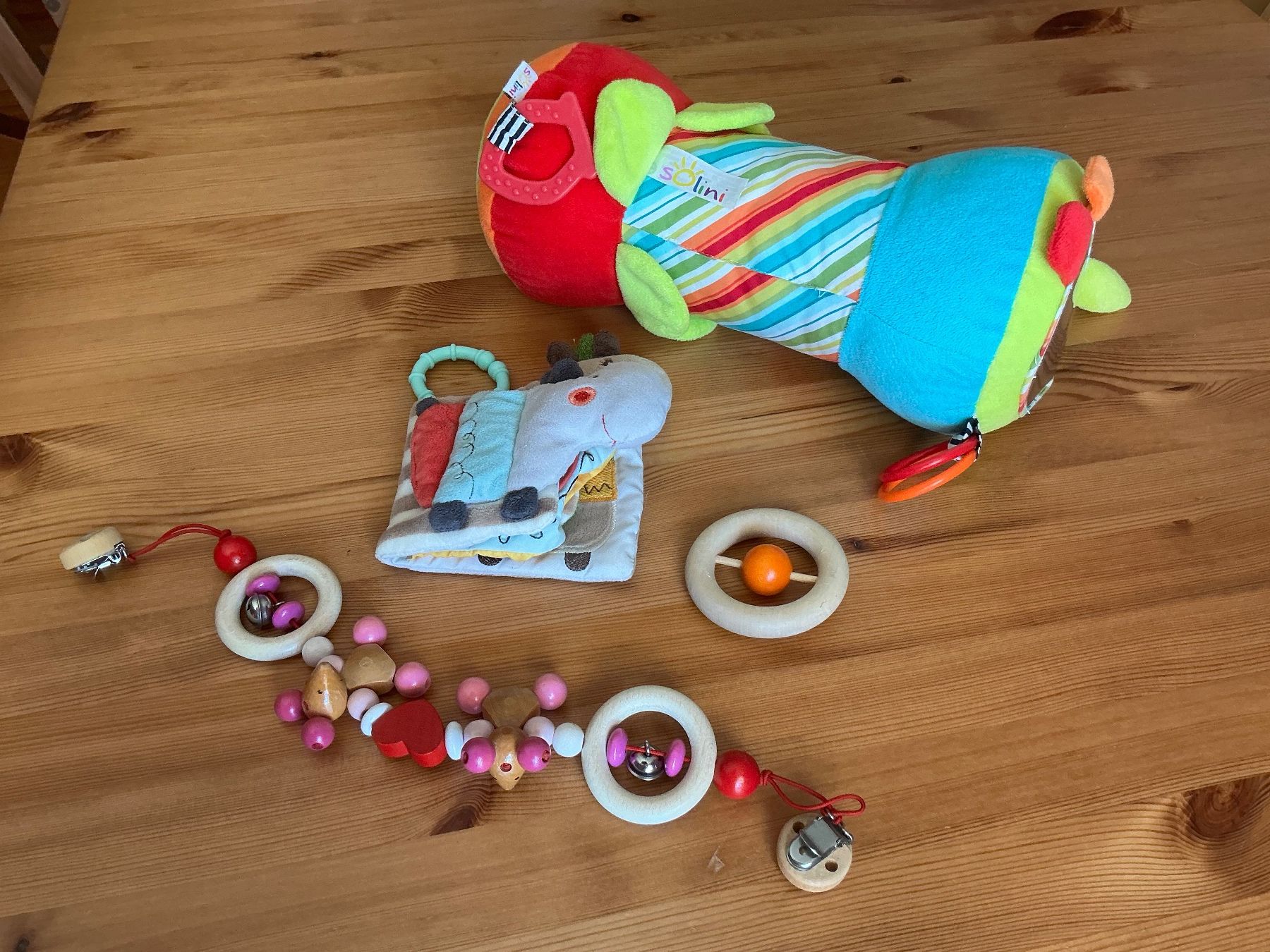 Giocattoli: Kinderwagenkette, Holz, Babybuch, Krabbelrolle, Greifling – Usato da Aesch BL venduto da Fortexx