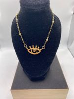 Collier avec pendentif mauvais œil avec pochette cadeau