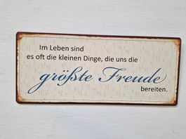 Metallschild mit Spruch