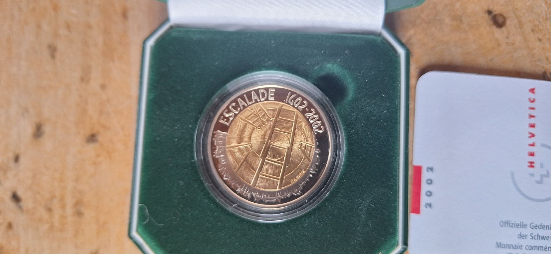 Tutti le monete: Pièce commémorative suisse Escalade 5 fr. 2002 – Nuovo e nell'imballaggio originale da Le Sentier venduto da Loorenz 1