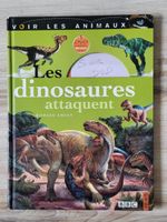 Livre voir les animaux - Les dinosaures attaquent