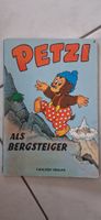Petzi als Bergsteiger