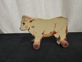 Holzspielzeug Kuh auf Rädern, antiker Zustand, L 17 cm