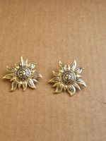 Goldene Sonnen Ohrclips Pierre Lang 