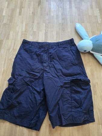 Short Woolrich, taille 31, parfait pour l'été!