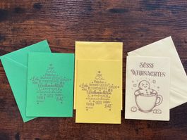 Drei Weihnachtskarten mit Umschlägen