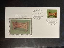 CH 1987 FDC PP Bauernmöbel Wiege Ortsstempel Cervio