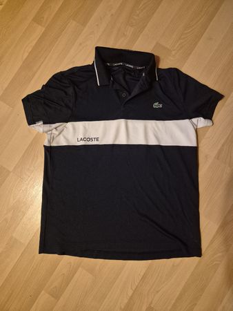 Lacoste Polohemd blau Grösse L ultra dry Technik