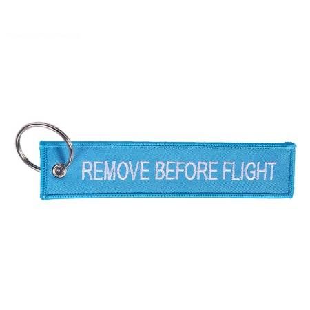 Portachiavi: Schlüsselanhänger REMOVE BEFORE FLIGHT hellblau – Nuovo e nell'imballaggio originale da Bern venduto da aeroshop.ch