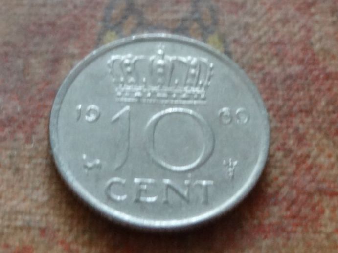 Tutti le monete: PAYS-BAS  Nederland  10  Cent  1969  (P) – Usato da Romanel-sur-Lausanne venduto da Swift13
