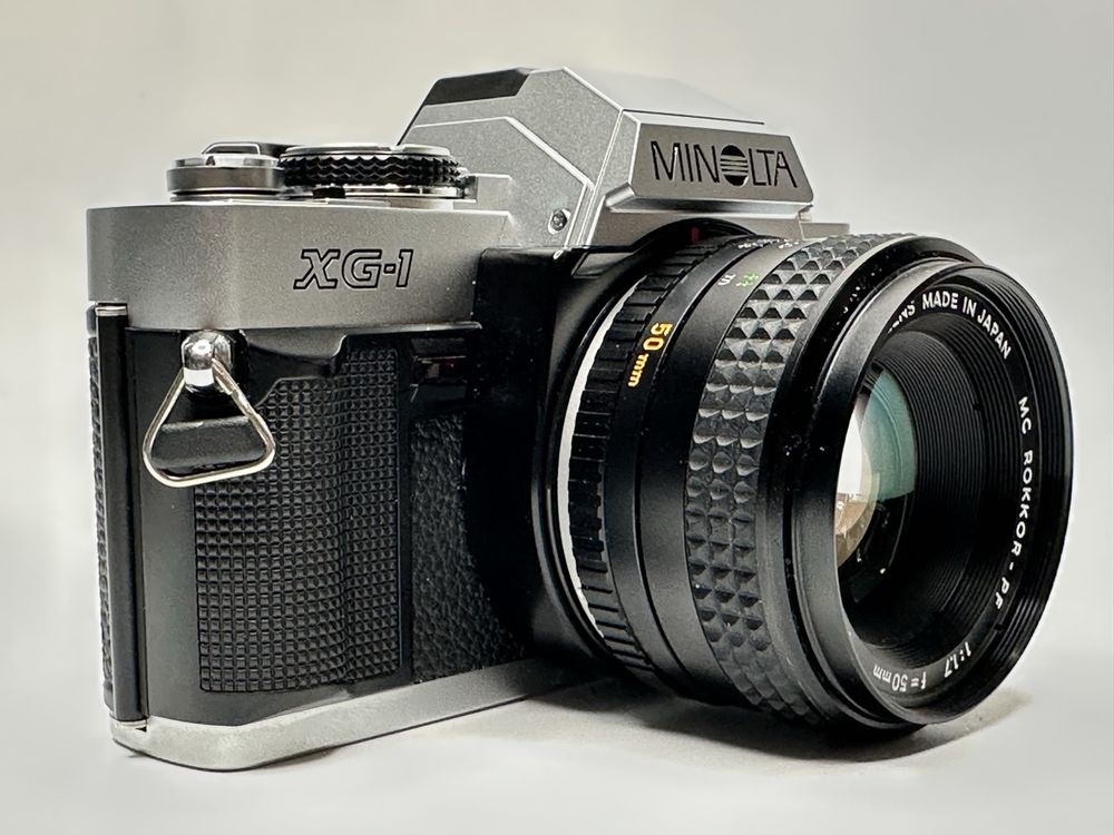 Minolta XG-M + Objectif 50mm + Moteur Drive 1 - Argentique Reflex (Occasion)