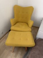 Sessel mit Hocker