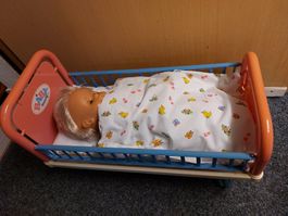 Baby Born Puppenbettli mit Puppe und "Inhalt"lt