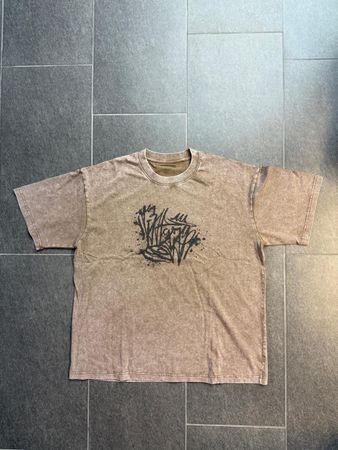 Premium vintage-washed streetwear w/ graffiti-inspired edge