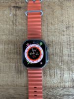 Apple Watch Ultra 49mm Titan mit original orange Ocean Band