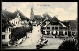 AK Herzogenbuchsee, Ortspartie mit Hotel de Soleil, Geschäft