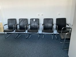 6 Stühle mit Lederüberzug
