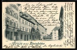 AK Rheinfelden, Strassenansicht mit Häusern und Geschäften