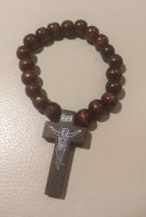 Kreuz, braunes elast. Armketteli, Holz
