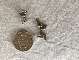2 pendentifs diablotins en métal