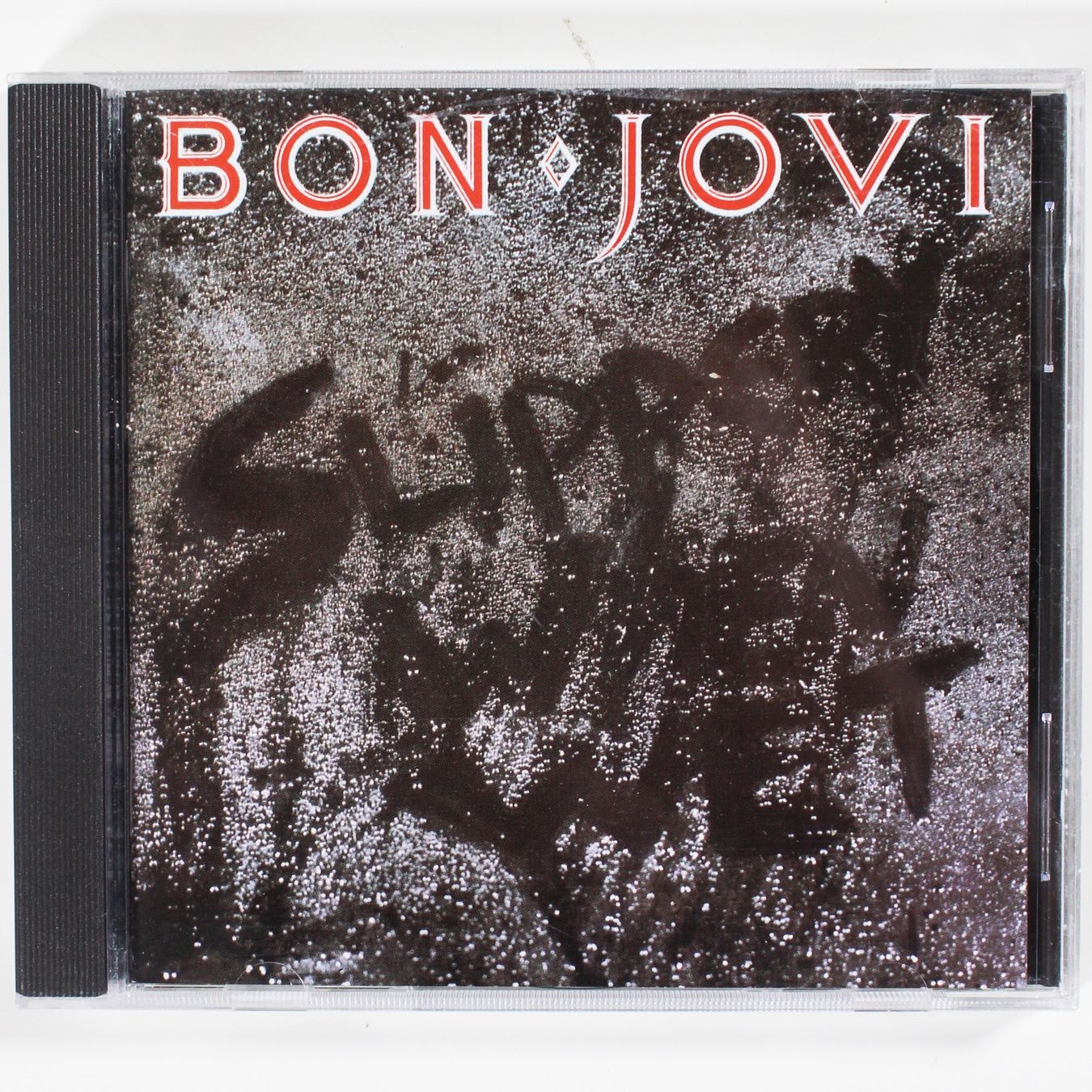 CD: CD BON JOVI - SLIPPERY WHEN WET 1986 – Usato da Brüttisellen venduto da Collector-Corner