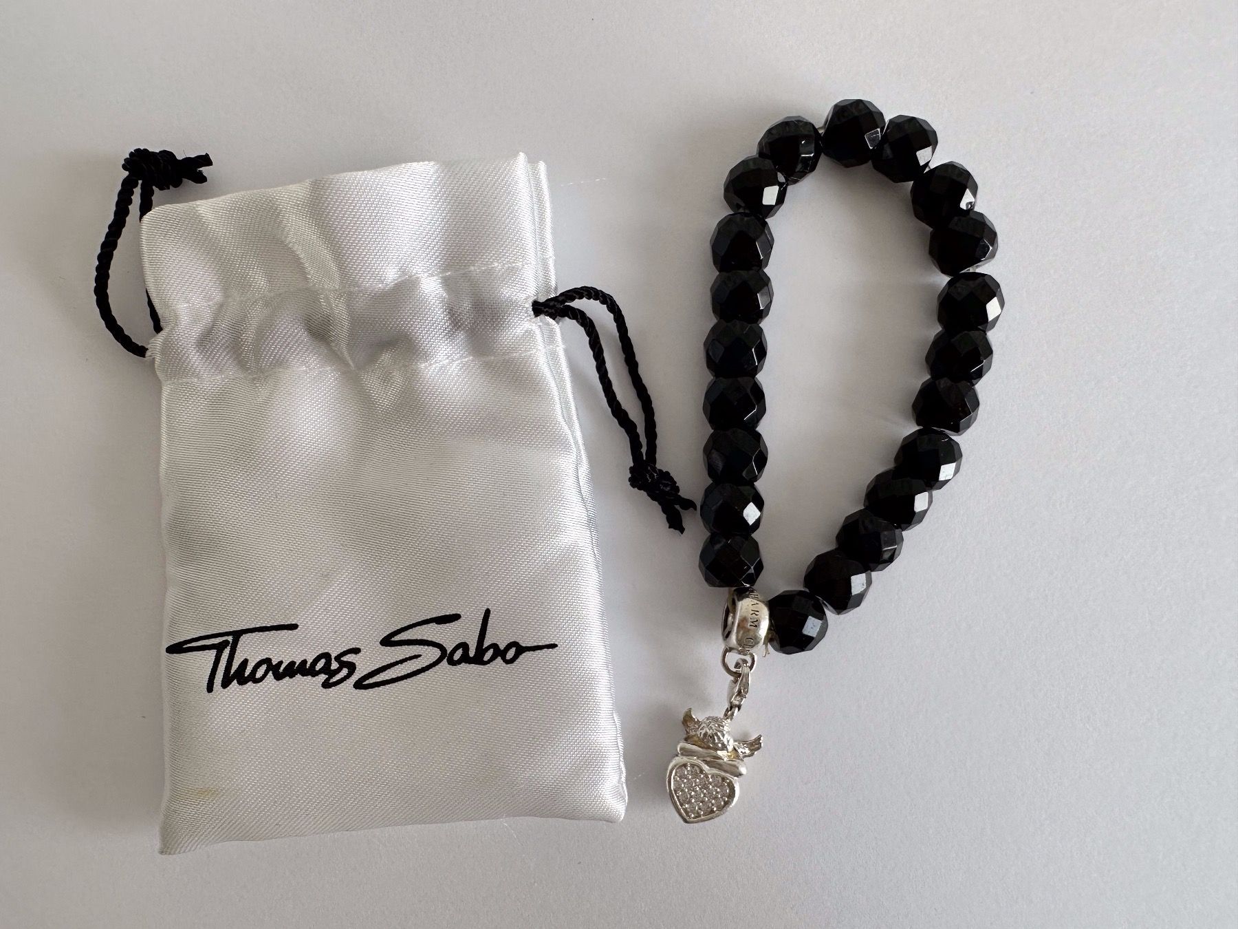 Thomas Sabo Armbänder & -reifen: Thomas Sabo Armkette schwarz mit silber Anhänger – Gebraucht aus Dübendorf von 9320
