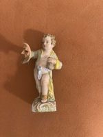 Statuetta in porcellana bambino con maschera