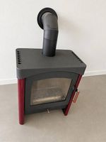 Poêle à bois avec conduit, état d'occasion bon